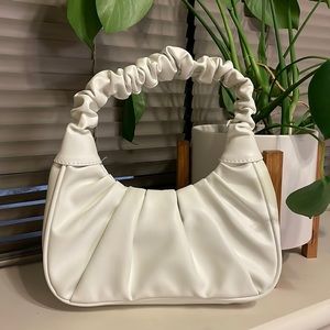 White dumpling handbag